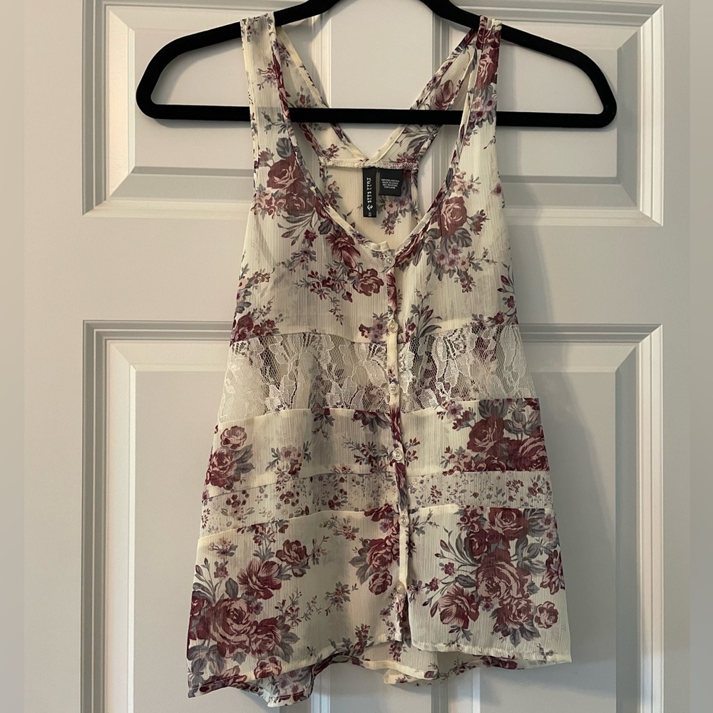 Floral ivory top with lace cutouts
